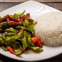 Beef With Horn Pepper Over Rice / 角椒牛肉飯 · Beef is stir-fried with horn pepper and topped with a light spicy and sweet sauce. Served wi...