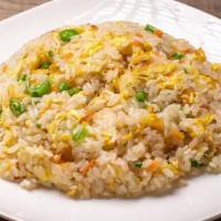 Fried Sticky Rice / 炒糯米飯 · Sticky rice is fried with eggs and various vegetables.
Ingredients: Flat beans, green onions...