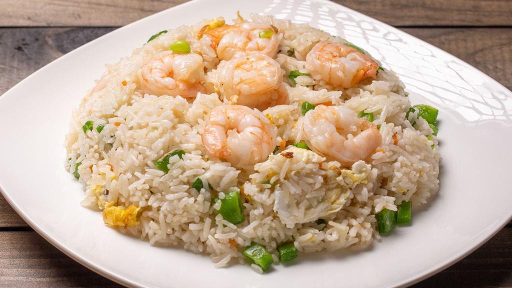 Shrimp Fried Rice / 虾炒飯 · Rice is fried with shrimp and various vegetables. Ingredients: shrimp, flat beans, green onions, carrots, eggs and rice.