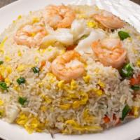 Seafood Fried Rice / 海鮮炒飯 · Rice is fried with shrimp, octopus, and various vegetables.
Ingredients: Shrimp, octopus, fl...