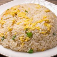 Egg Fried Rice / 蛋炒飯 · Rice is fried with green onion and eggs.
Ingredients: Green onions, eggs, and rice.