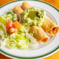 Taquitos · Beef or chicken rolled in fried corn tortillas served with guacamole.