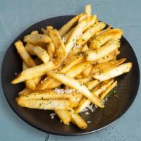 Garlic Parmesan Fries · Idaho potato fries cooked until golden brown & garnished with salt, garlic, and parmesan.