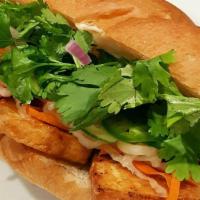 Tofu Banh Mi Sandwich (Vegetarian) · Pickled radish carrot, cilantro, hot pepper, special sauce on french roll.