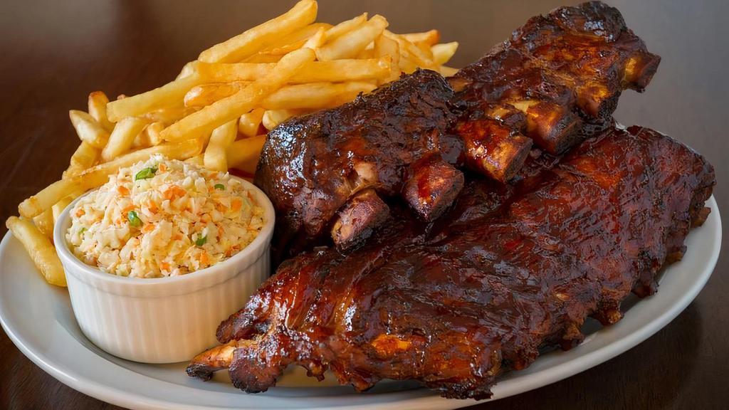 Whole Baby Back Rib Combo · Slow cooked baby back rib seasoned & cooked by Jason's own' Texas style  recipe.  Whole baby rib, garden salad, coleslaw. bbq sauce and choice of rice or FF.