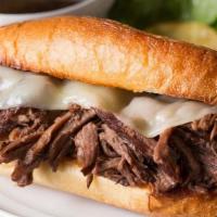 French Dip · Roast Beef Soaked in mushroom sauce and dip in mushroom sauce as you eat . sauteed onion and...