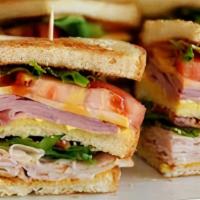Club Sandwich · Ham, american cheese, turkey/swiss cheese, lettuce, tomatoes, bacon, mayo.