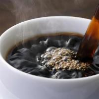 Premium Hot Brewed  Coffee · Locally Roasted Freshly  Ground & Brewed  Premium Coffee