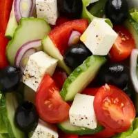 Greek Salad · Romaine, olive, carrot, cucumber, mixed pepper, red cabbage, tomatoes and feta.
