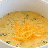 Cheesy-Broccoli Soup · made from scratch on premises with cook Jason's own recipe serve on bread bowl for eat-in an...