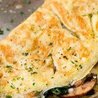 Spinach-Mushroom Omelette · Sauteed baby spinach and mushroom