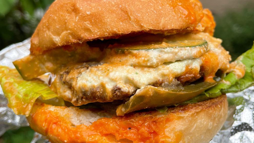 Hot Stuff Burger · House pickled jalapenos, house made buffalo sauce, cucumber, romaine, cashew dill cream cheese & house burger patty on a bun