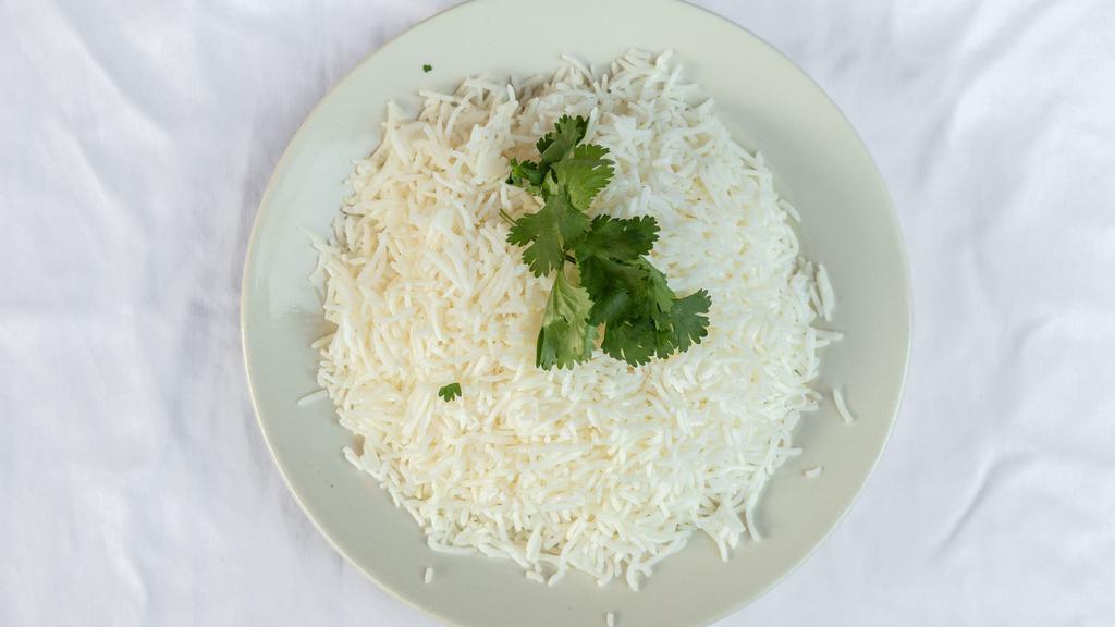 Steamed Rice · Steam cooked basmati rice.