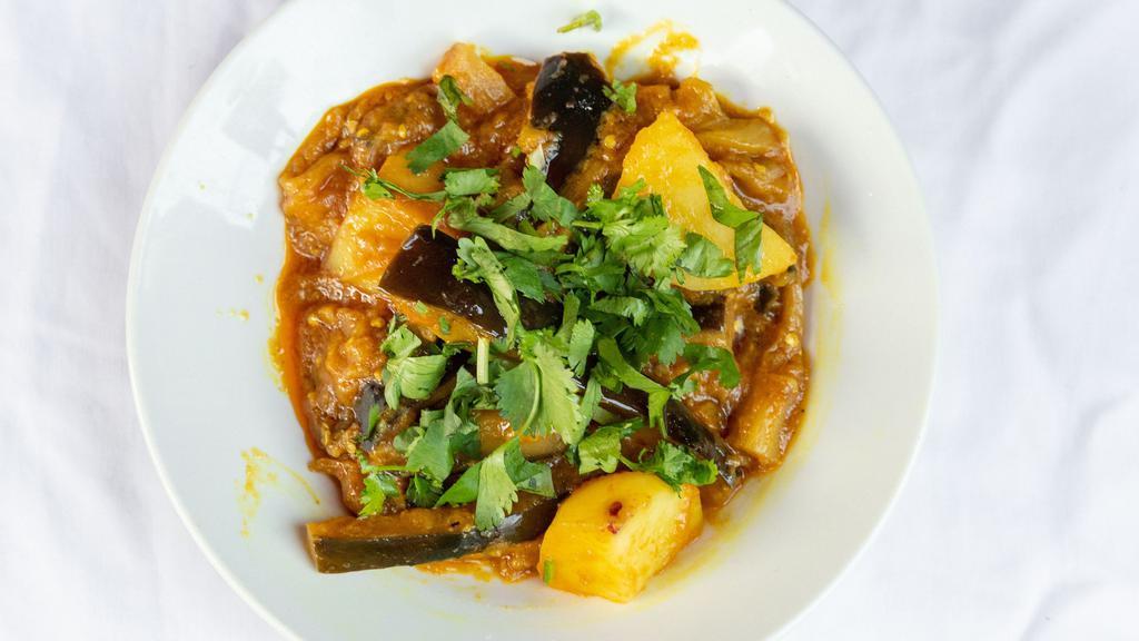 Aloo Bangon · Potatoes and eggplant cooked with spices, herbs and onions.