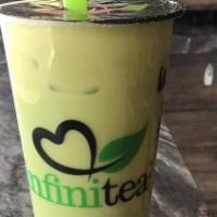 Snow Matcha · 2-layered smoothie: coconut on top, matcha on bottom. Comes with custard pudding.