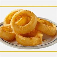 Onion Rings  · Sliced onions dipped in a light batter and fried until crispy and golden brown!