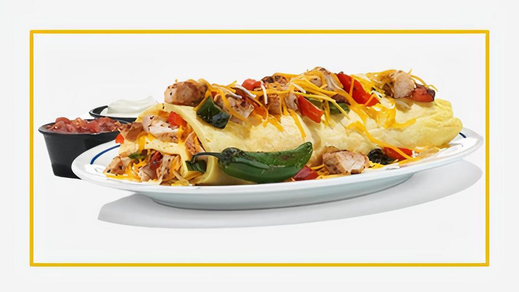 Rita'S Grilled Chicken Fajita Omelette · Grilled chicken, onions, green, and red peppers omelette served with home fries and toast. Additional veggies and cheese were optional.