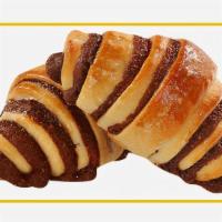 Chocolate Croissant · Freshly baked chocolate croissant with a flaky, and buttery texture.
