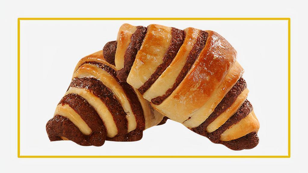 Chocolate Croissant · Freshly baked chocolate croissant with a flaky, and buttery texture.