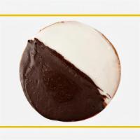 Black & White Cookie · A new york tradition, these classic cookies combine a soft cake-like cookie with rich dark c...