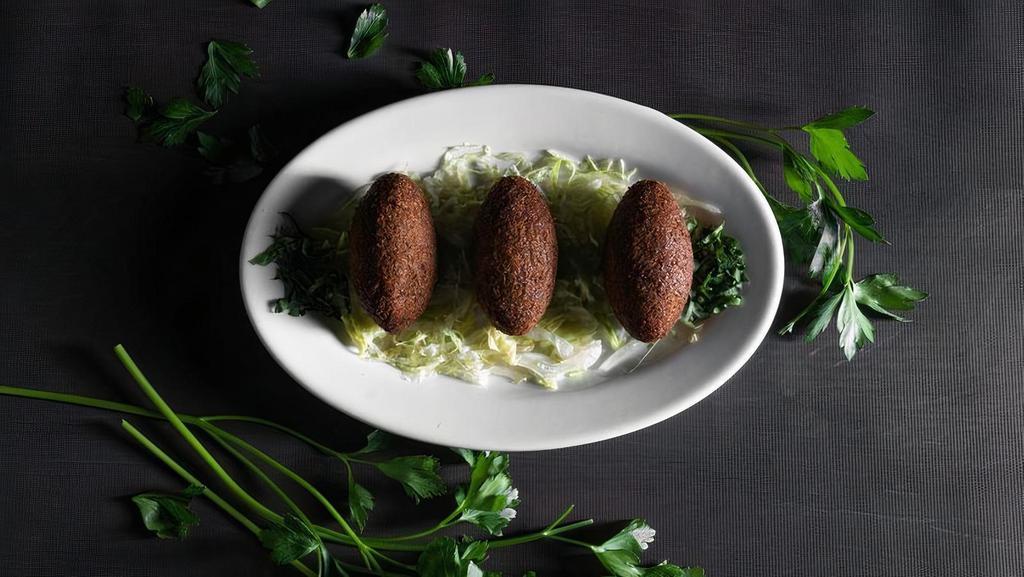 Kibbeh (3) · Bourgoul, ground beef & spices w/ meat, pine nuts & onions