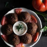 Falafel · Finely ground chickpeas, onions, parsley, garlic & spices deep fried