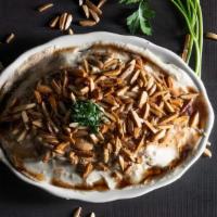 Fatteh - W/ Yogurt · Toasted pita bread w/ chick peas, yogurt or hummus & pine nuts