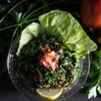 Tabouleh - Large · Cracked wheat, parsley, onions, tomato, lemon juice & oil