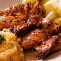 Chicken Chops · Grilled marinated chicken thighs