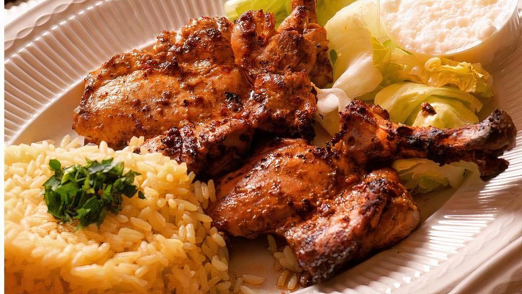 Chicken Chops · Grilled marinated chicken thighs