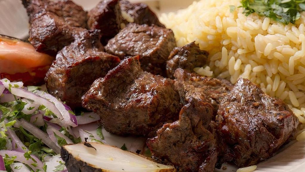 Shish Kebab · Grilled marinated cubes of skewered meat