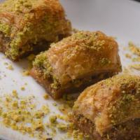 Baklava · Rich, sweet pastry made of layers of filo filled with chopped nuts and sweetened & held ...