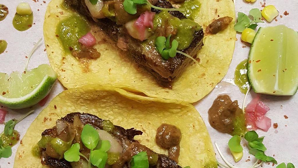 Tacos De Costilla & Tuétano · Beef short ribs, bone marrow, roasted red onion-jalapeño chile toreado salsa