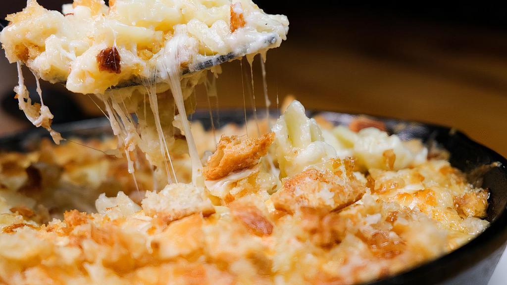 White Cheddar Mac & Cheese · Fusilli, three cheese béchamel, breadcrumbs (add truffle breadcrumbs for an additional charge).