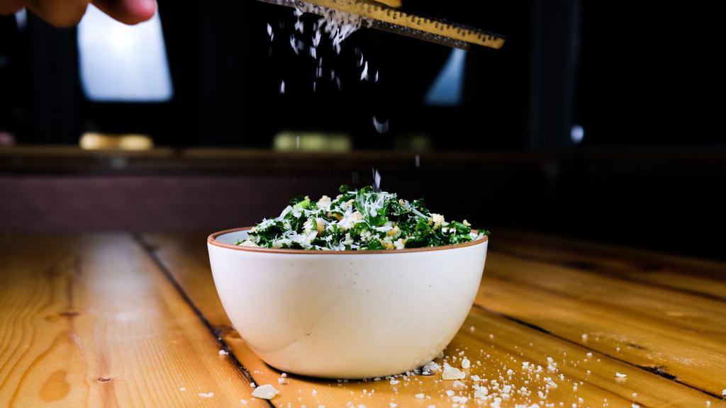 Kale Salad · Curly kale, garlic-lemon dressing, breadcrumbs, Parmesan.