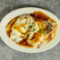 Chicken Sorrentino · Sauteed chicken breast topped with prosciutto, eggplant, and melted mozzarella in a light br...