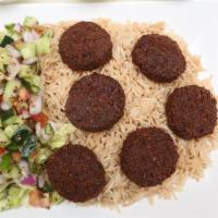 Falafel Platter · Spiced mashed chickpeas deep fried. Includes rice, protein and salad.