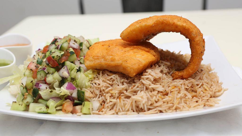 Fried Fish Platter · Wild cod fish battered and fried in peanut oil. Includes rice, protein and salad.