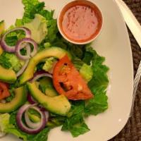 Avocado Salad · Mixed greens with sliced avocado.