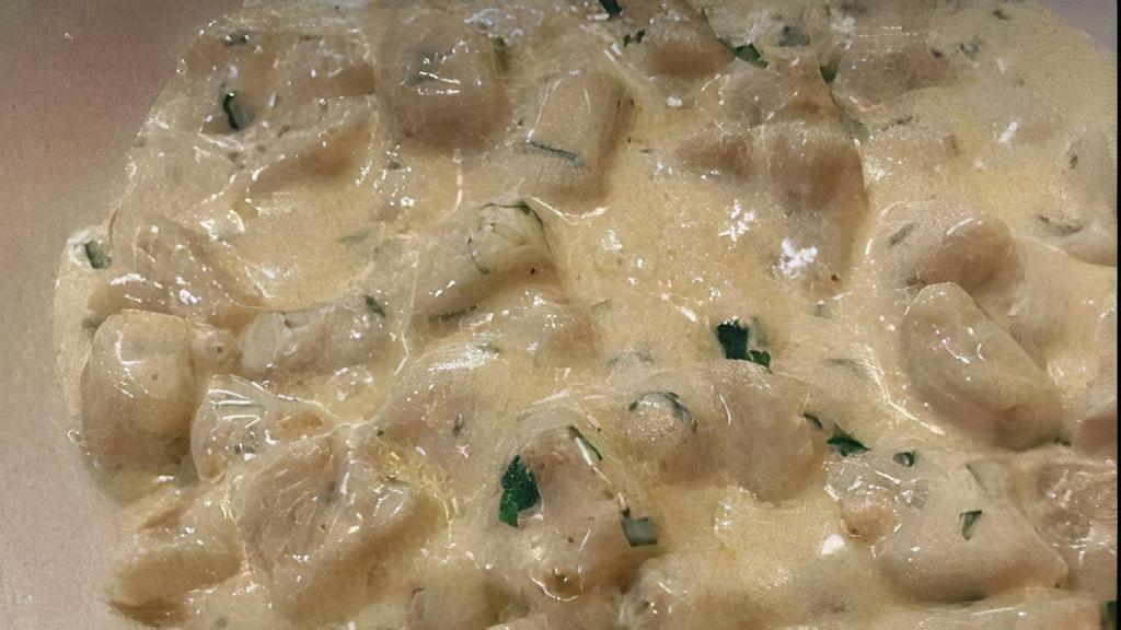 Gnocchi Bolognese · Homemade potato gnocchi, northern Italian meat sauce, fresh ricotta cheese