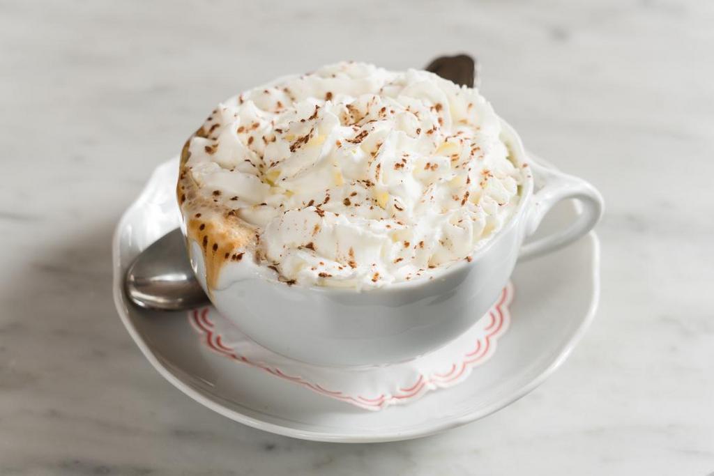 Cappuccino Viennese · Cappuccino with whipped cream and cocoa powder.