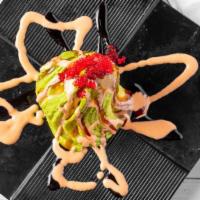 Avocado Bomb. · spicy tuna wrapped in avocado slices w/ crunch, fish egg and eel sauce, spicy mayo