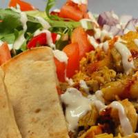 Chicken Halal Boys Platter · Most popular. Served over rice, salad, pita and our signature sauce.