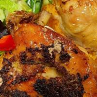 Oven Backed Chicken  · marinated chicken backed to perfection served with basmati rice, salad, pita bread, and hous...