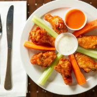  6 Pieces  Homemade Chicken Wings · Served with carrots, celery sticks and ranch or blue dressing.
