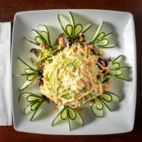 Avocado Salad · Fresh greens topped with a mix of avocado, cucumber and chef's special sauce.