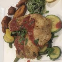 Tilapia Aleja · Gluten free. Pan-seared tilapia topped with a roast beet port wine sauce served on a bed of ...