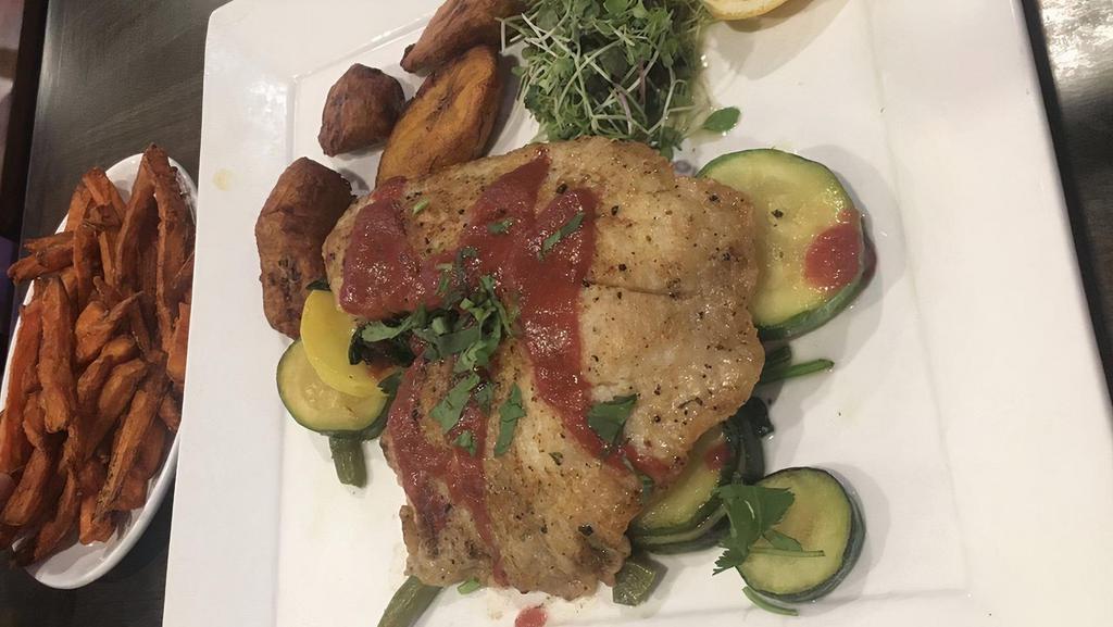 Tilapia Aleja · Gluten free. Pan-seared tilapia topped with a roast beet port wine sauce served on a bed of sauteed spinach and grilled vegetables.