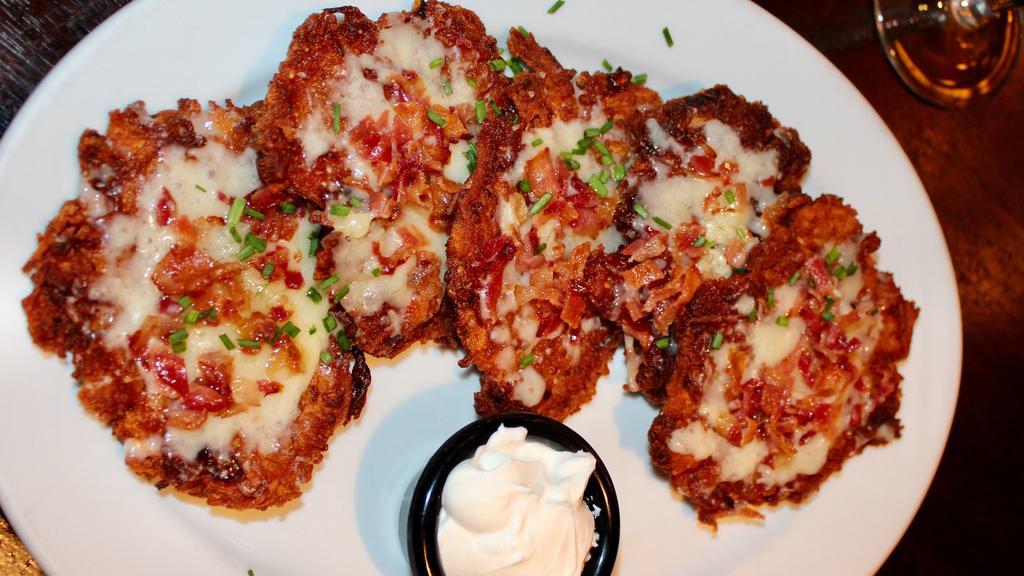 Bacon Cheddar Boxty · Potato pancakes, cheddar, bacon, chives. Served with sour cream