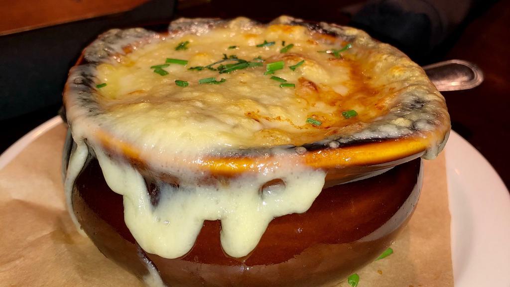 French Onion Soup · Toasted French baguette, Swiss cheese
